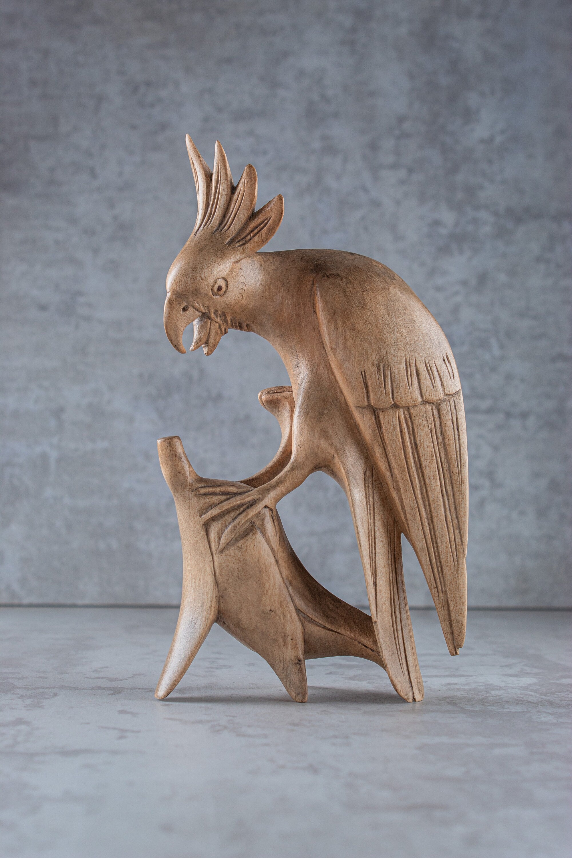 Hand-carved wooden cockatoo parrot sculpture