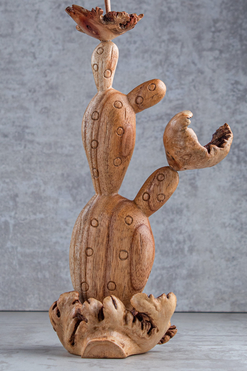 Hand-carved wooden hummingbird cactus flower sculpture