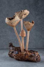 Handmade wooden flower mushroom figurine made from sustainable parasite wood, natural wood grain visible